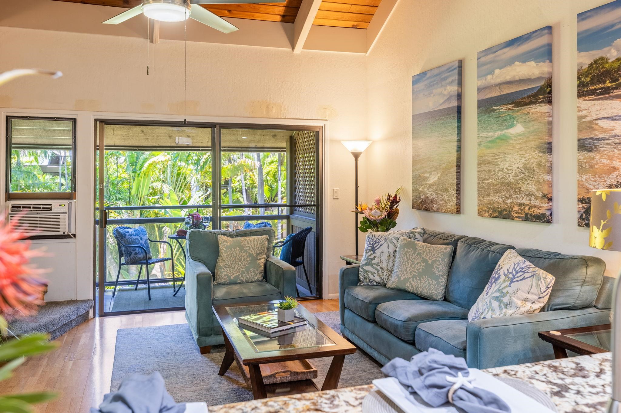 777 South Kihei Road, Unit 221G Kihei, HI 96753 - Photo 2 of 50 a living room with furniture and a large window
