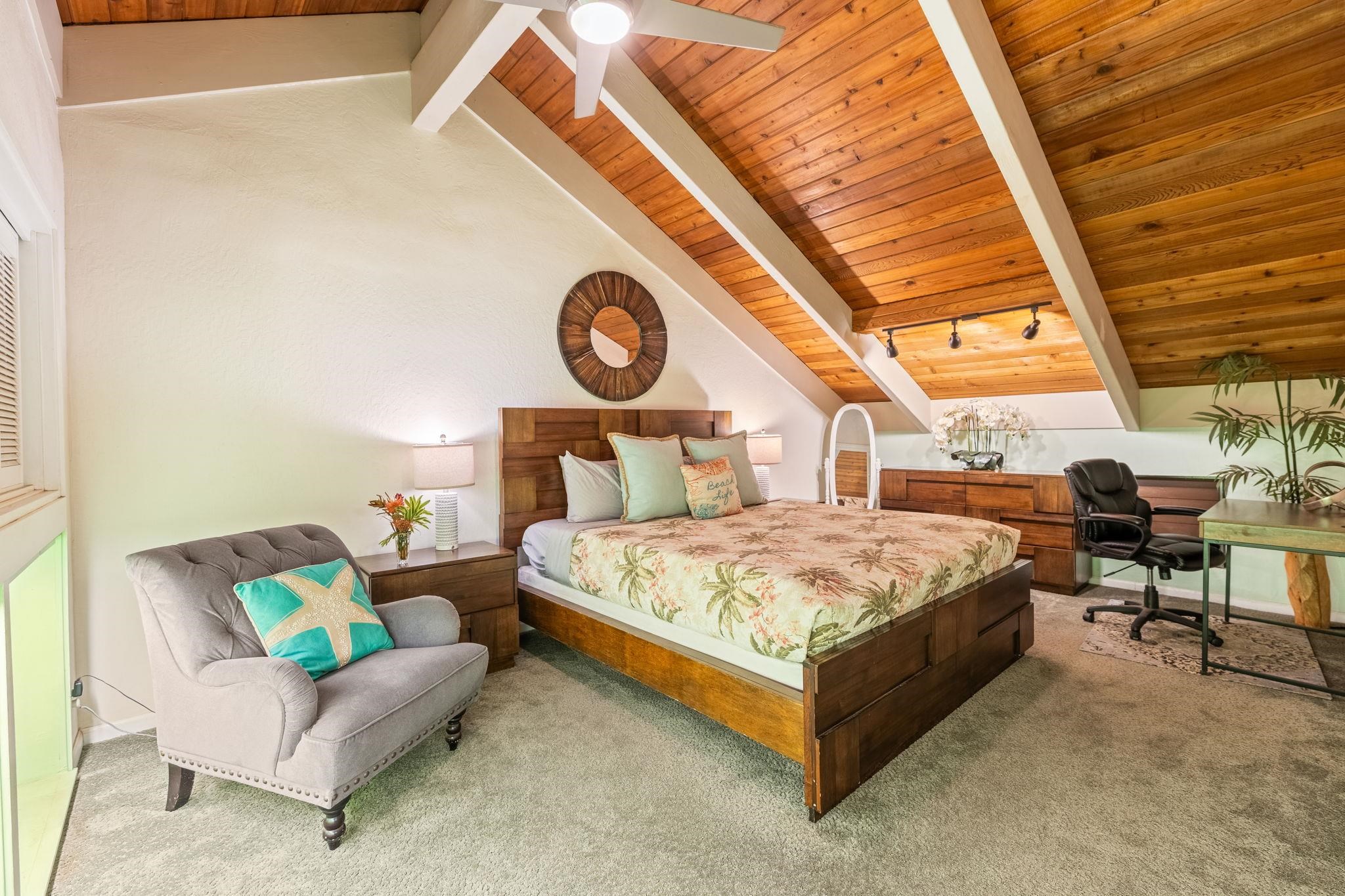 777 South Kihei Road, Unit 221G Kihei, HI 96753 - Photo 26 of 50 a bedroom with a bed a clock and a large window