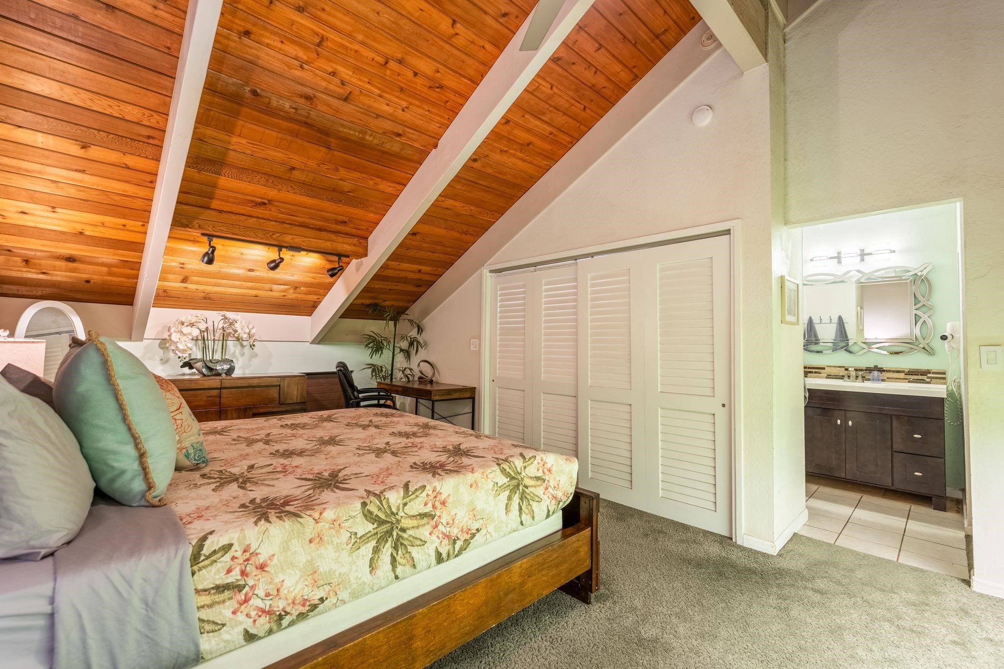 777 South Kihei Road, Unit 221G Kihei, HI 96753 - Photo 27 of 50 a large bed sitting in a bedroom next to a window