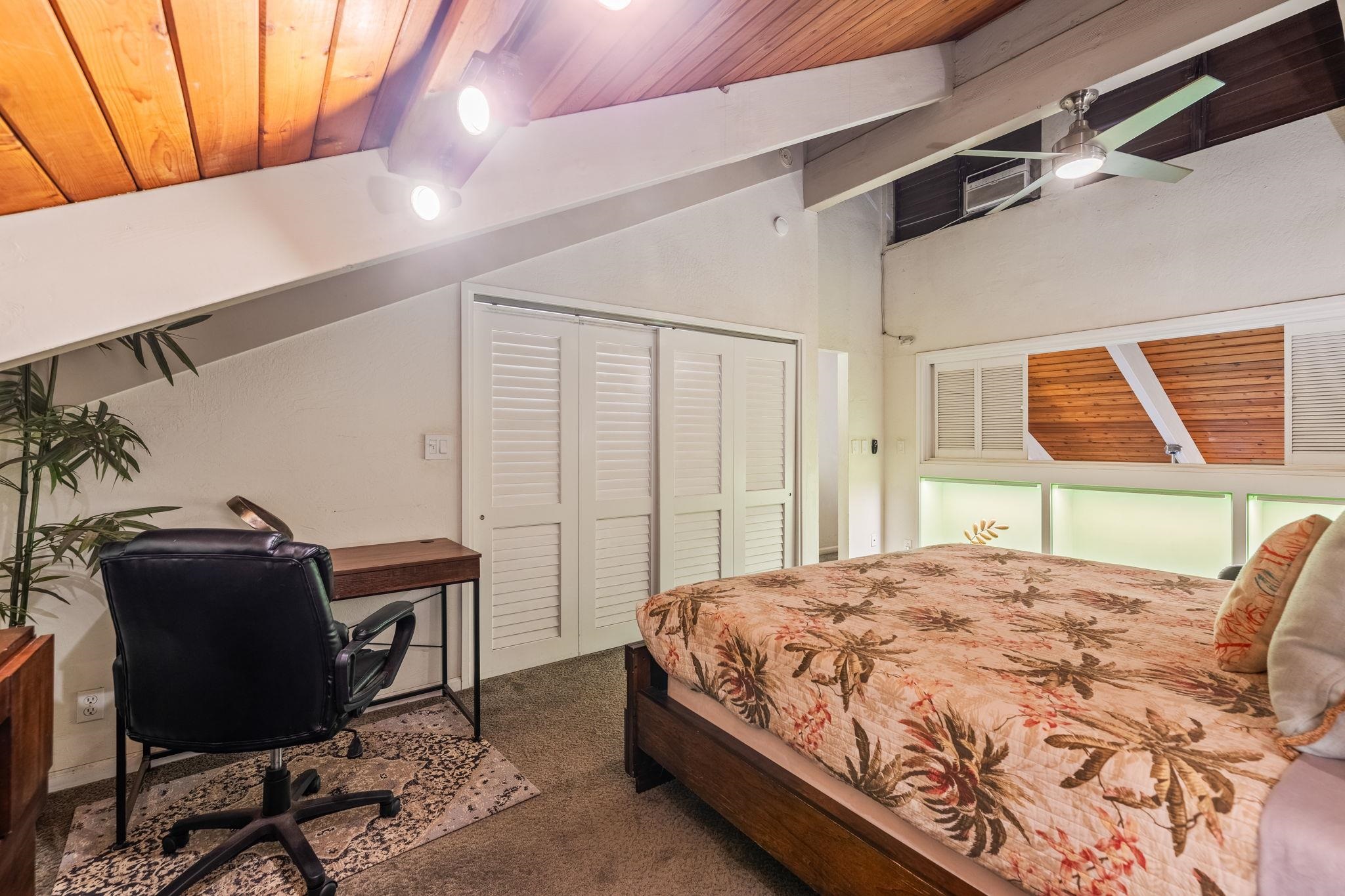 777 South Kihei Road, Unit 221G Kihei, HI 96753 - Photo 30 of 50 a bedroom with a bed and a desk