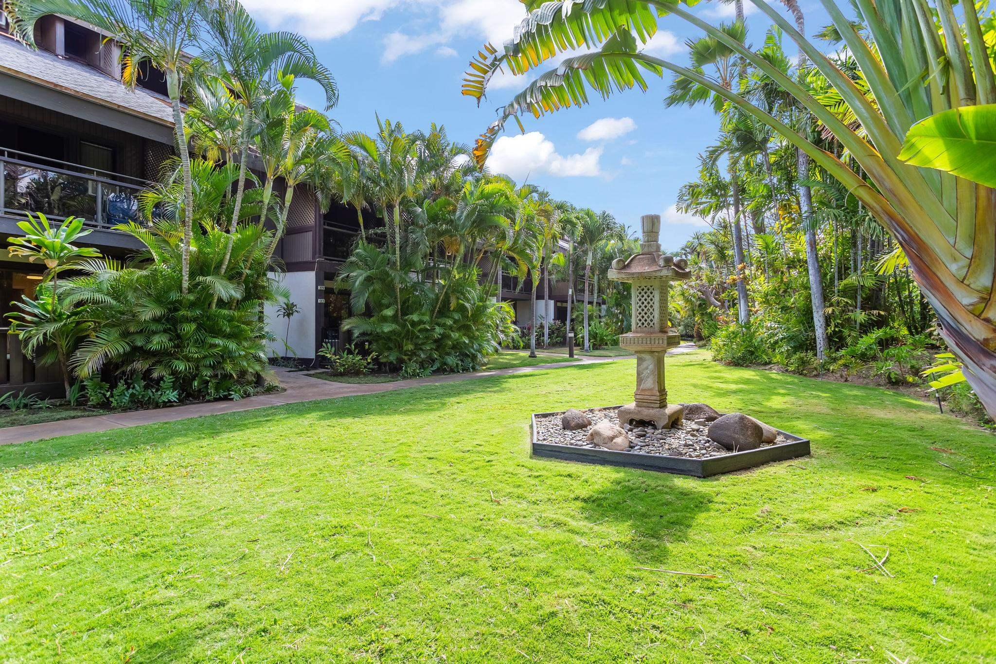 777 South Kihei Road, Unit 221G Kihei, HI 96753 - Photo 33 of 50 a front view of a house with a yard