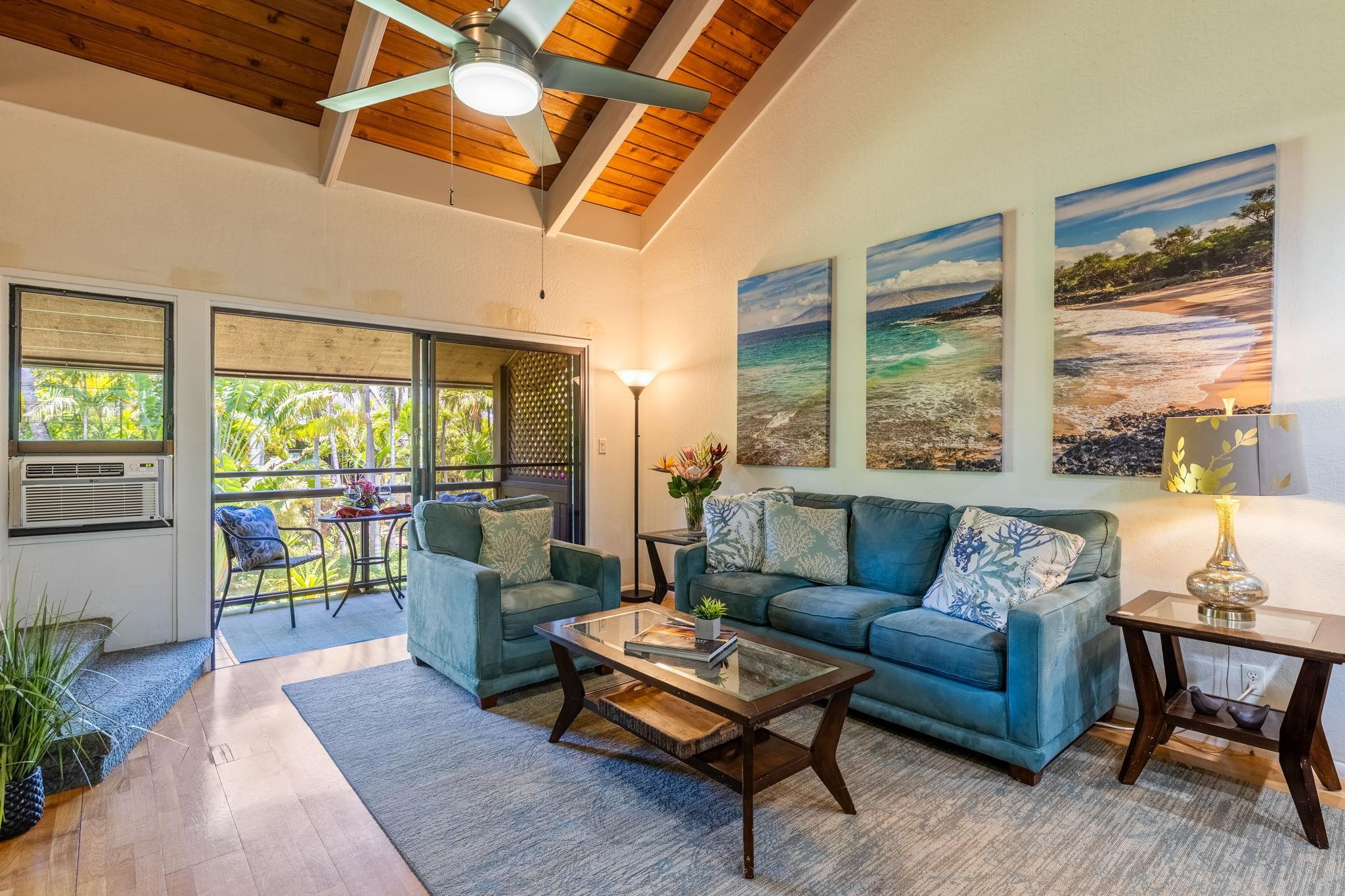 777 South Kihei Road, Unit 221G Kihei, HI 96753 - Photo 5 of 50 a living room with furniture and a gate