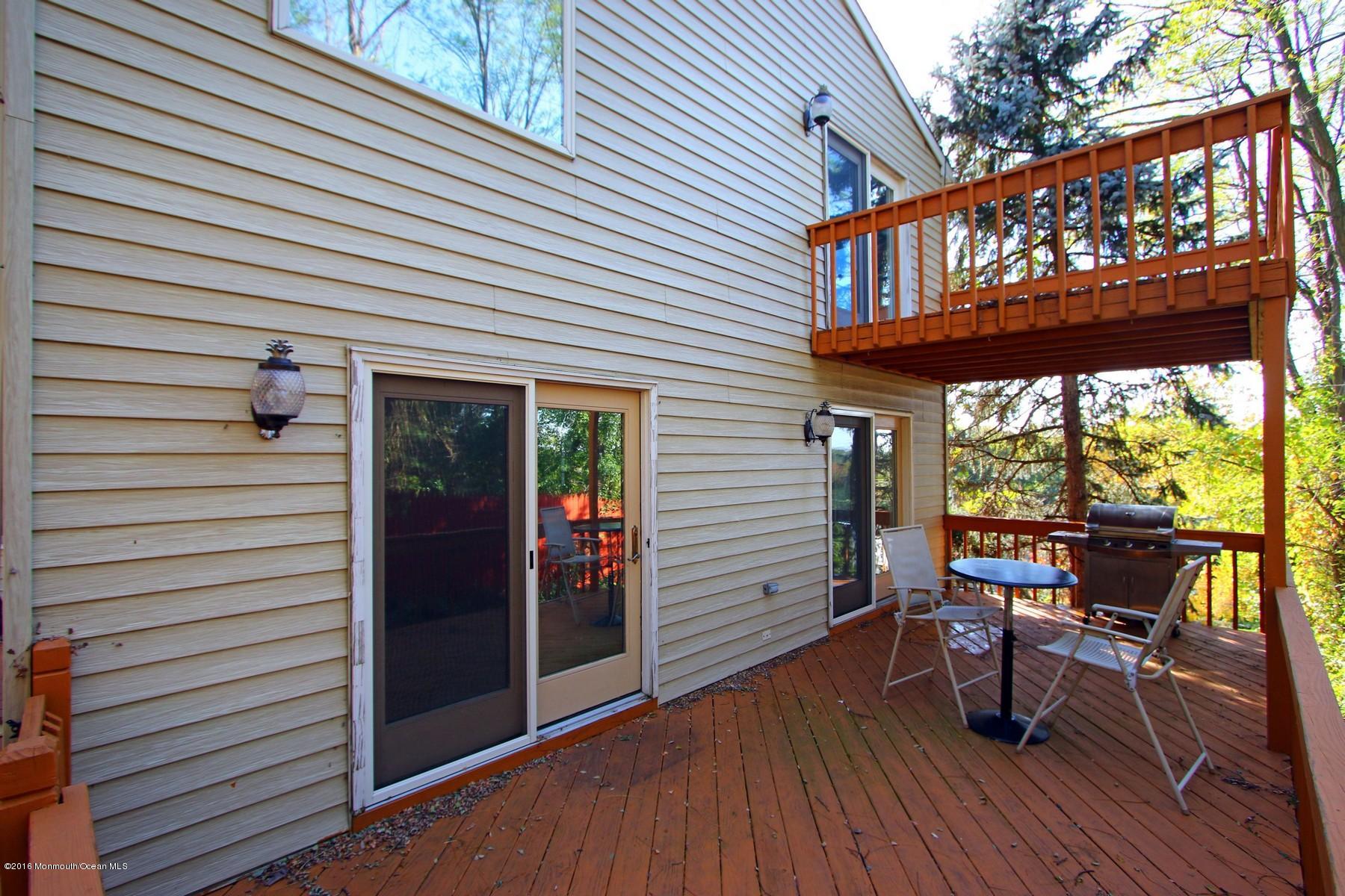 16 Bay Hill Road Middletown, NJ 07737 - Photo 8 of 47 Side Deck off of Dining Area