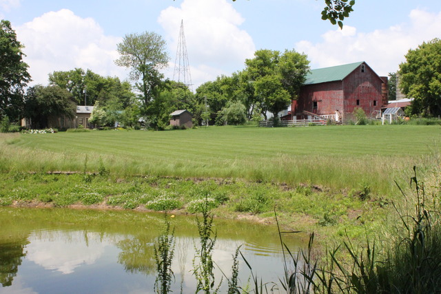 5249 Halley Road Rockford, IL 61101 - Photo 7 of 20 a view of a lake with a yard