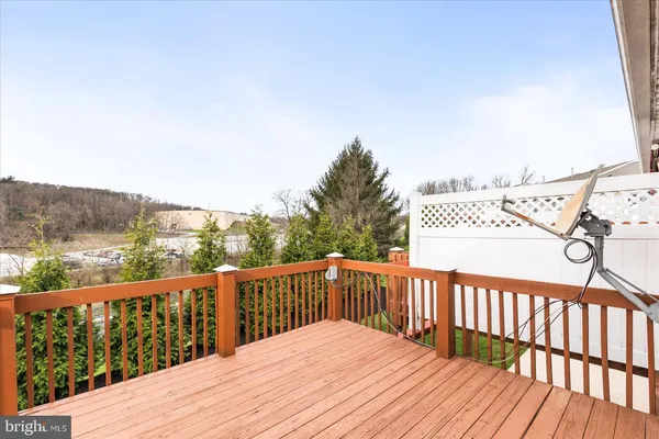 a view of a wooden roof deck