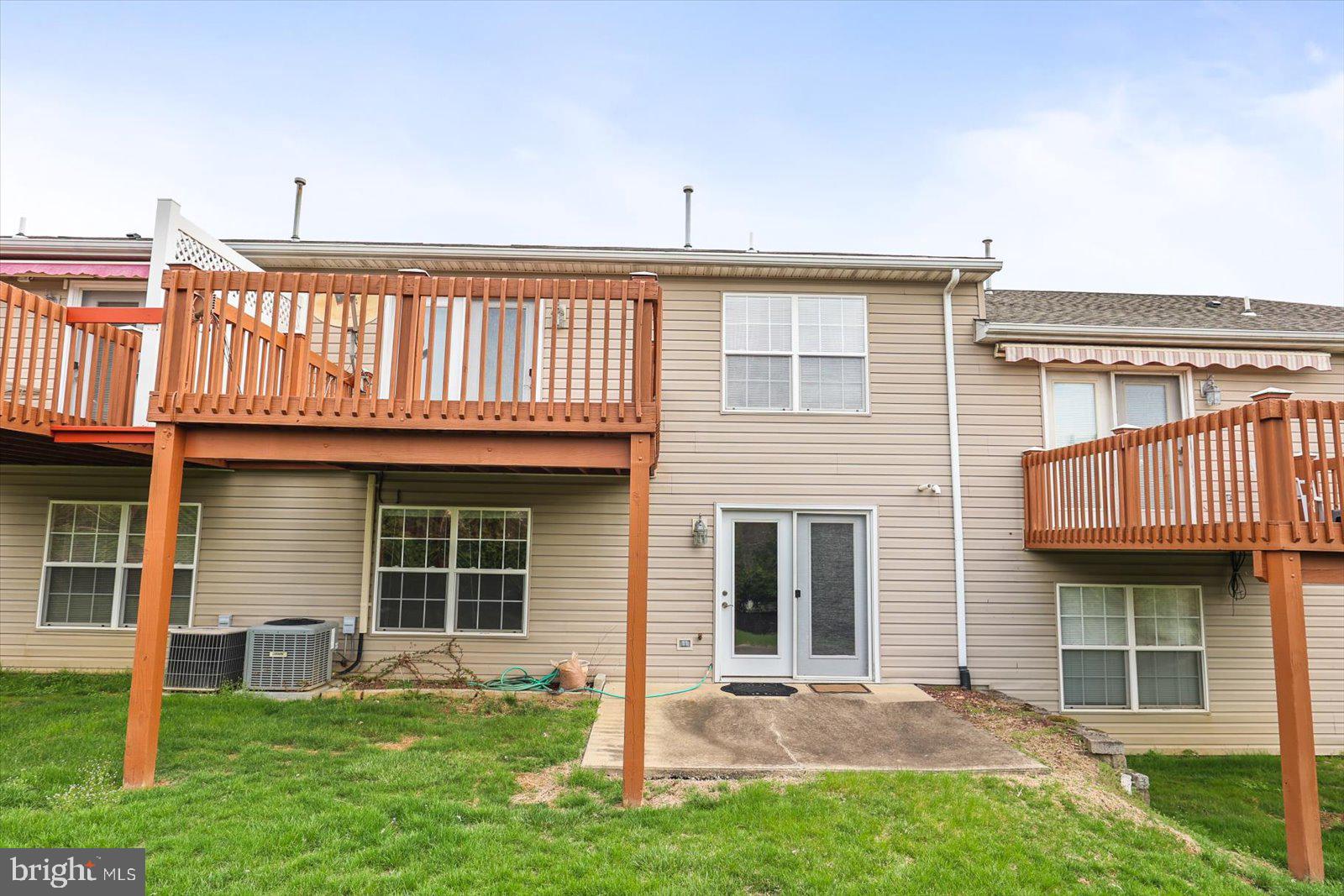 99 Furlong Way, Unit 99 Red Lion, PA 17356 - Photo 30 of 49 a front view of a house with a yard