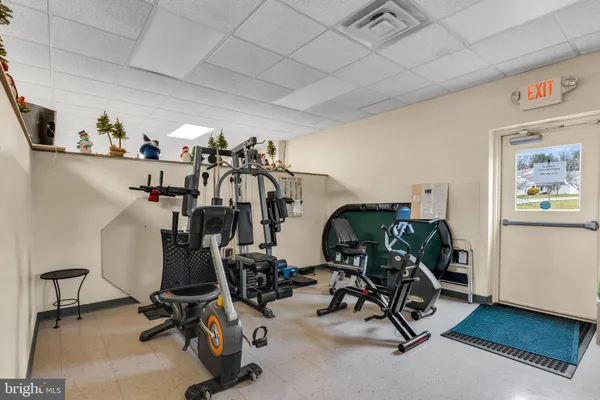 a room with furniture and a flat screen tv