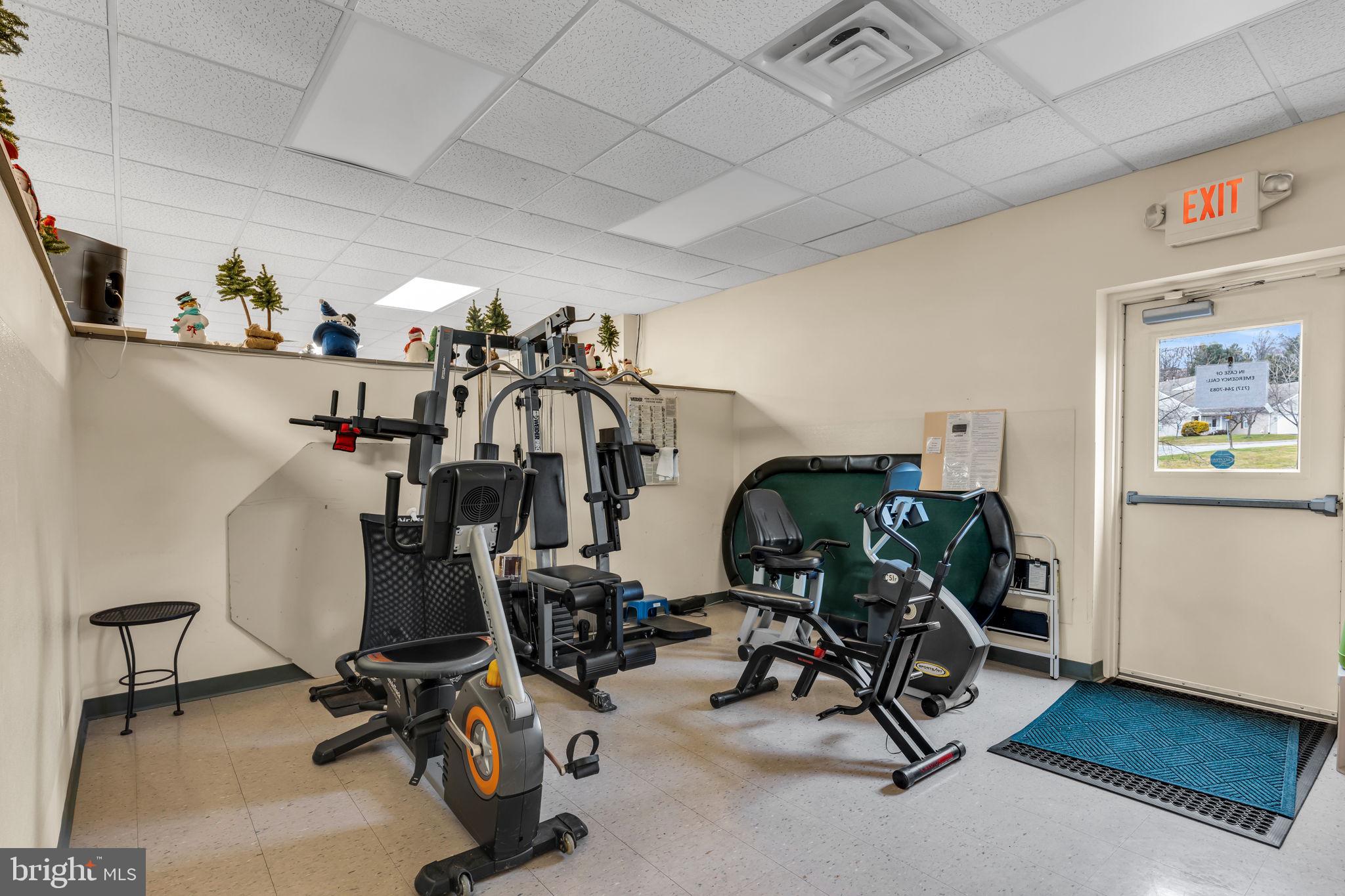99 Furlong Way, Unit 99 Red Lion, PA 17356 - Photo 40 of 49 a view of a room with gym equipment