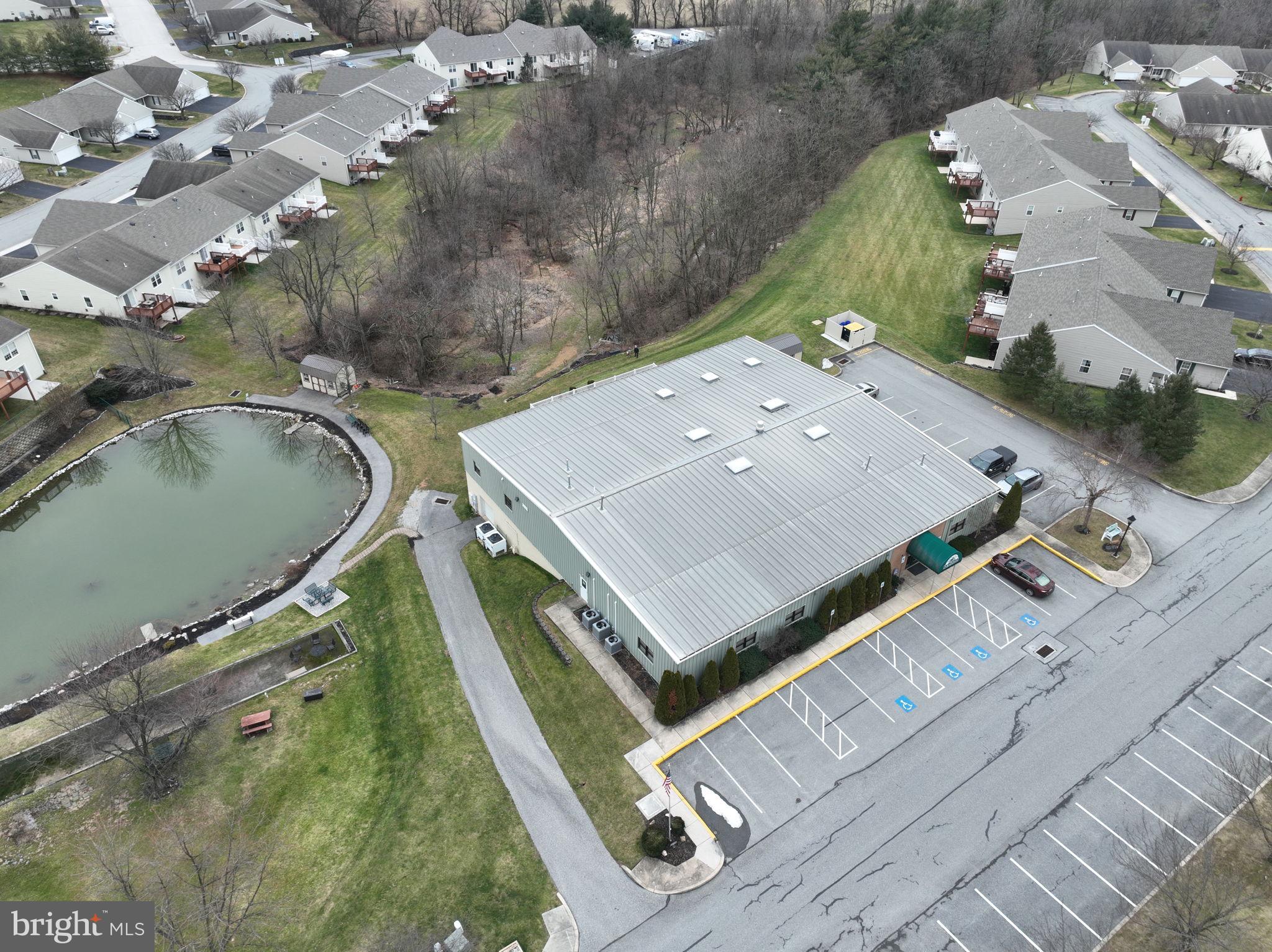 99 Furlong Way, Unit 99 Red Lion, PA 17356 - Photo 44 of 49 an aerial view of a house with a yard