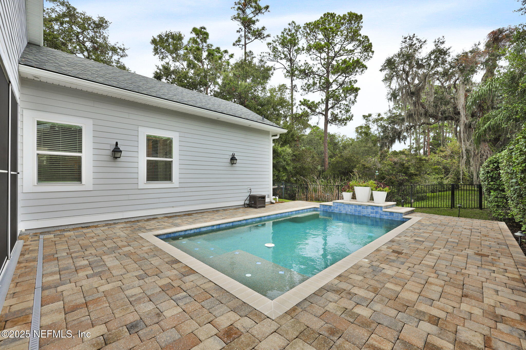 2624 Wrightson Drive Jacksonville, FL 32223 - Photo 24 of 52 a view of a swimming pool with a yard