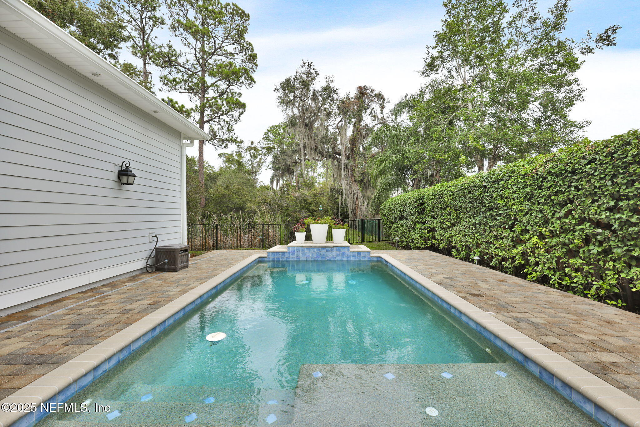 2624 Wrightson Drive Jacksonville, FL 32223 - Photo 25 of 52 a view of a small pool with a yard