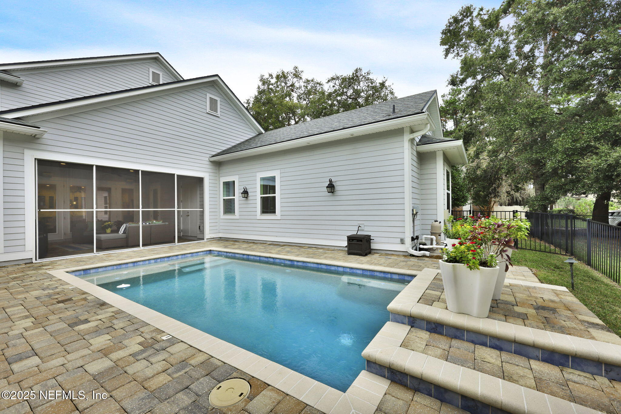 2624 Wrightson Drive Jacksonville, FL 32223 - Photo 26 of 52 a view of a house with a swimming pool
