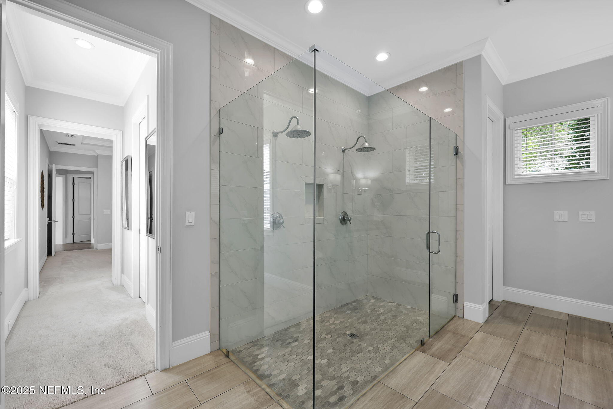 2624 Wrightson Drive Jacksonville, FL 32223 - Photo 34 of 52 a bathroom with a shower and a sink