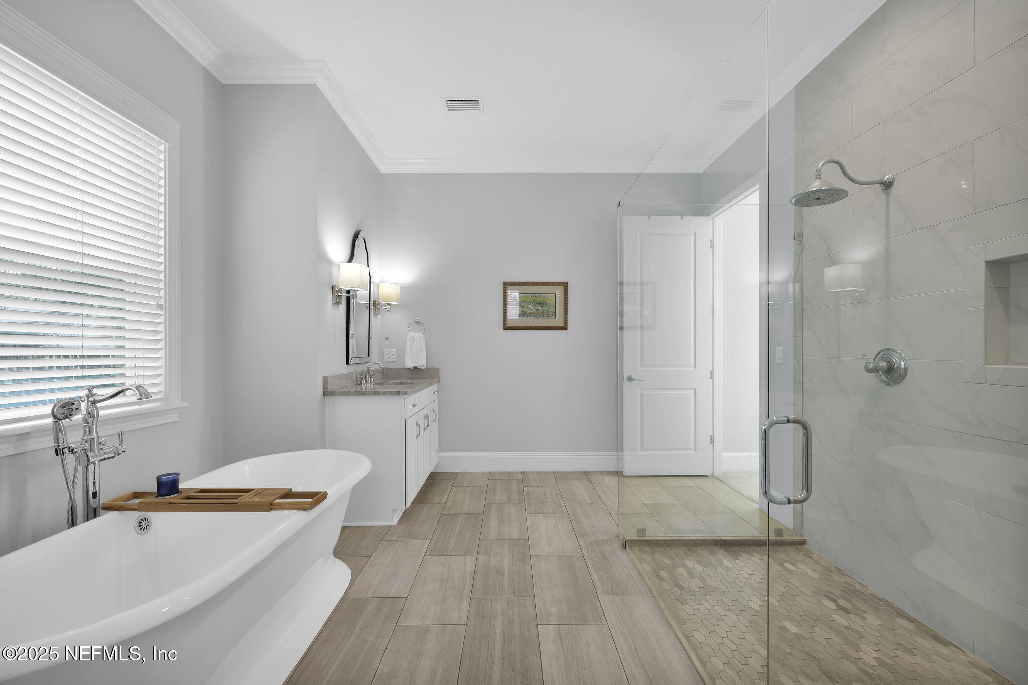 2624 Wrightson Drive Jacksonville, FL 32223 - Photo 35 of 52 a bathroom with a granite countertop sink a toilet a mirror and shower