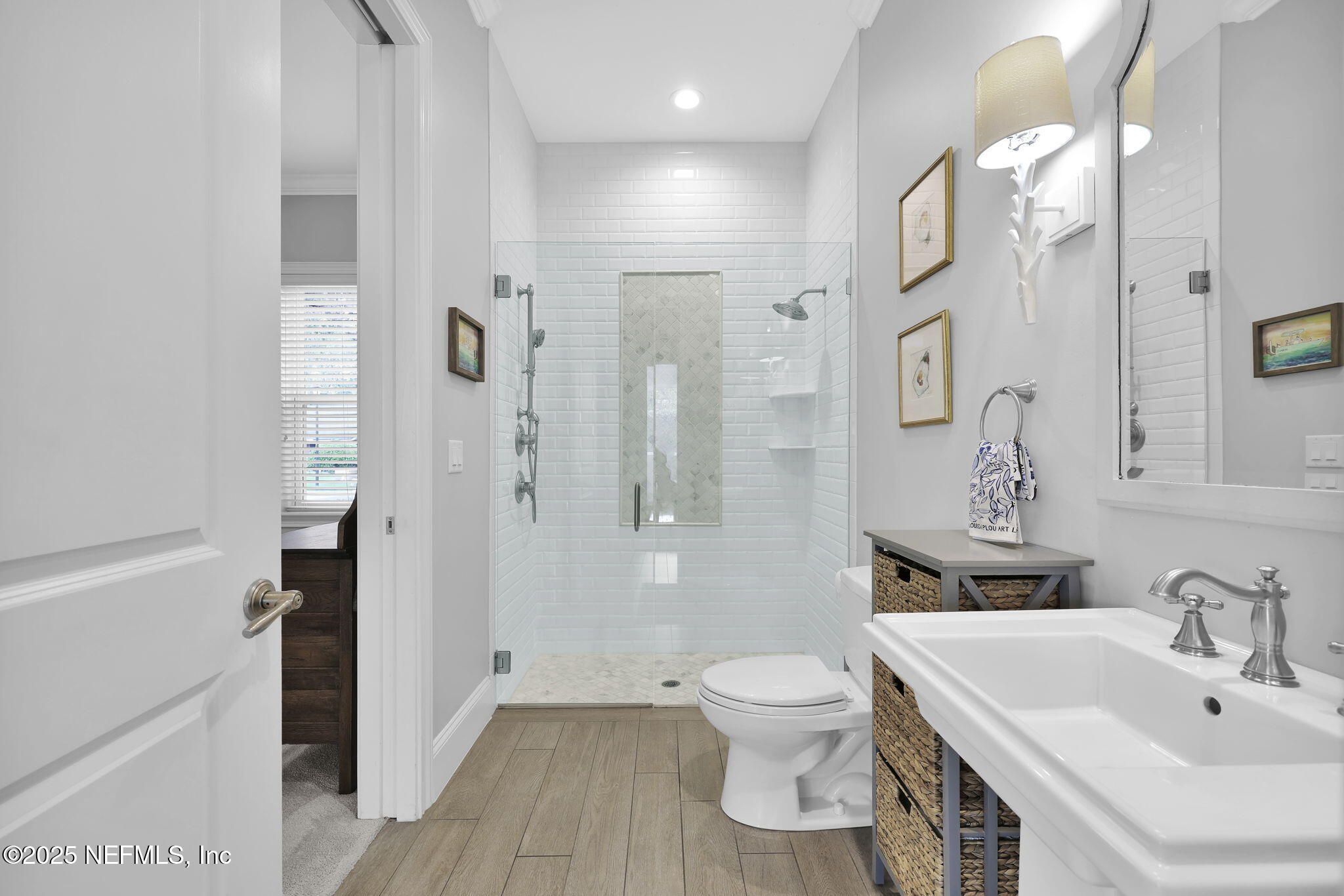 2624 Wrightson Drive Jacksonville, FL 32223 - Photo 39 of 52 a bathroom with a sink toilet and shower