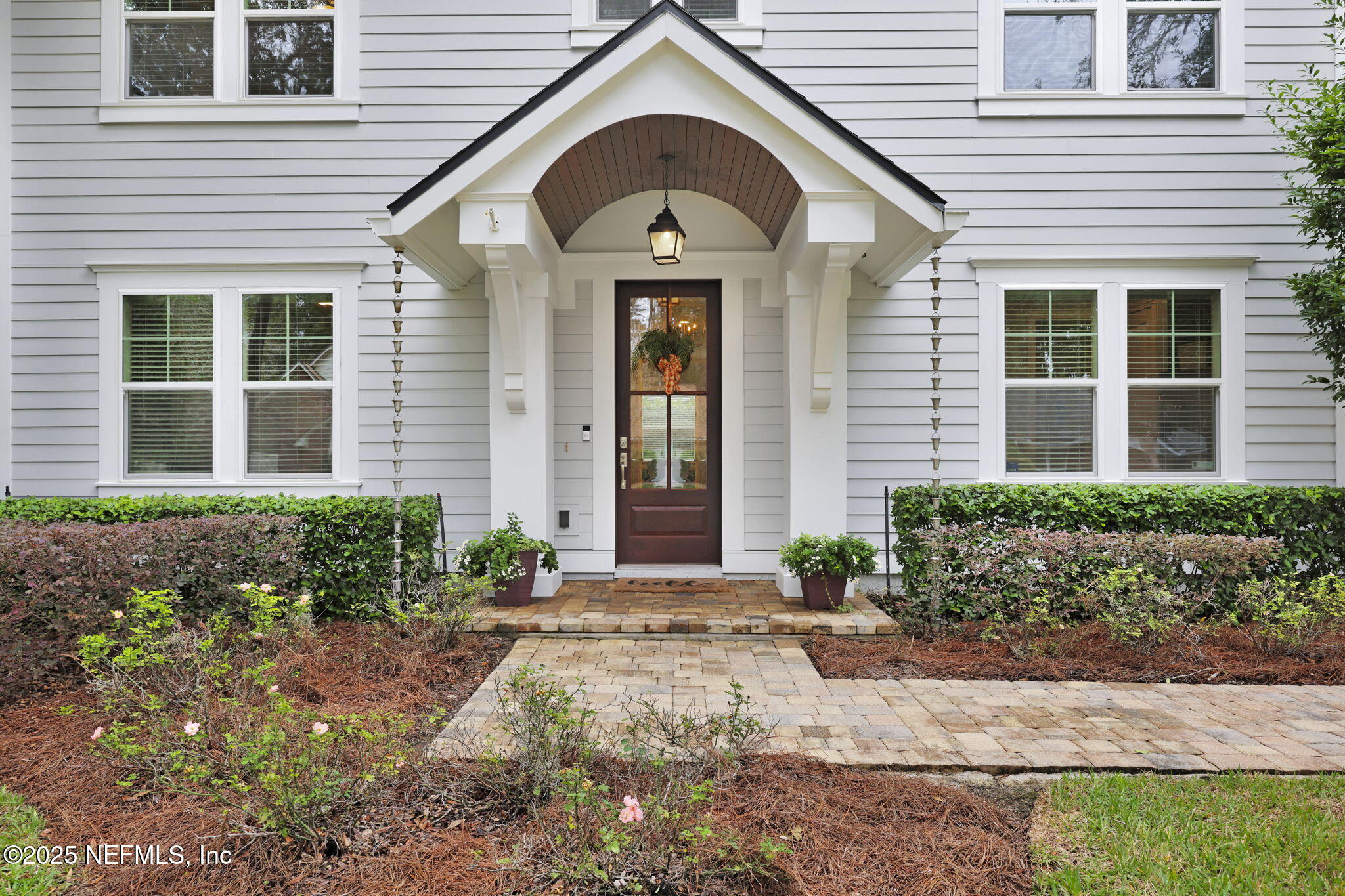 2624 Wrightson Drive Jacksonville, FL 32223 - Photo 4 of 52 a front view of a house with garden