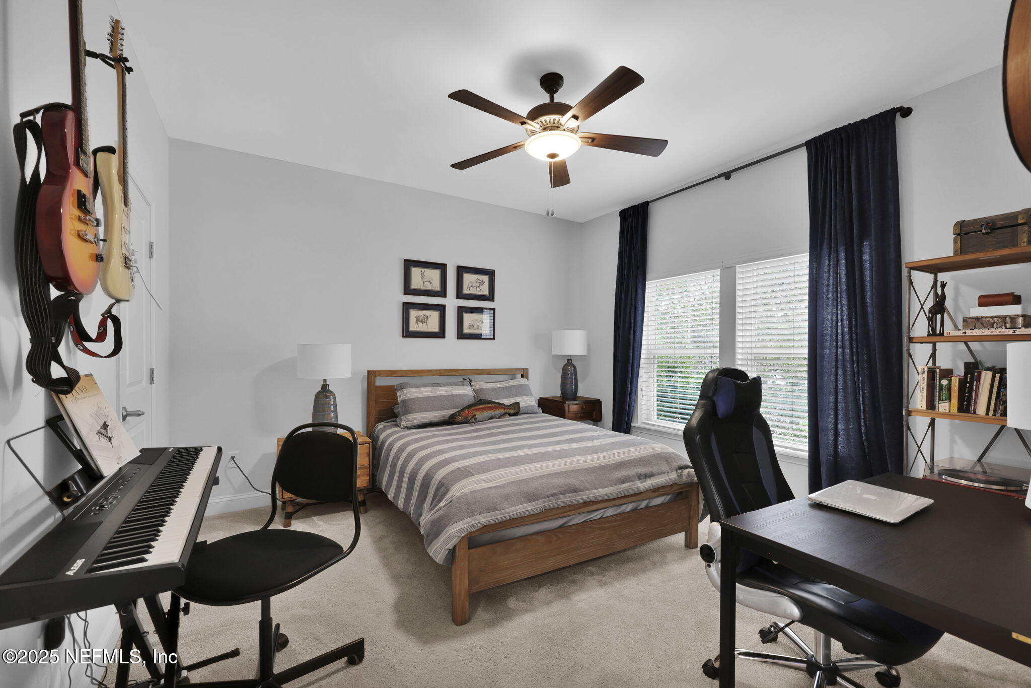 2624 Wrightson Drive Jacksonville, FL 32223 - Photo 48 of 52 a bedroom with a bed window and a desk
