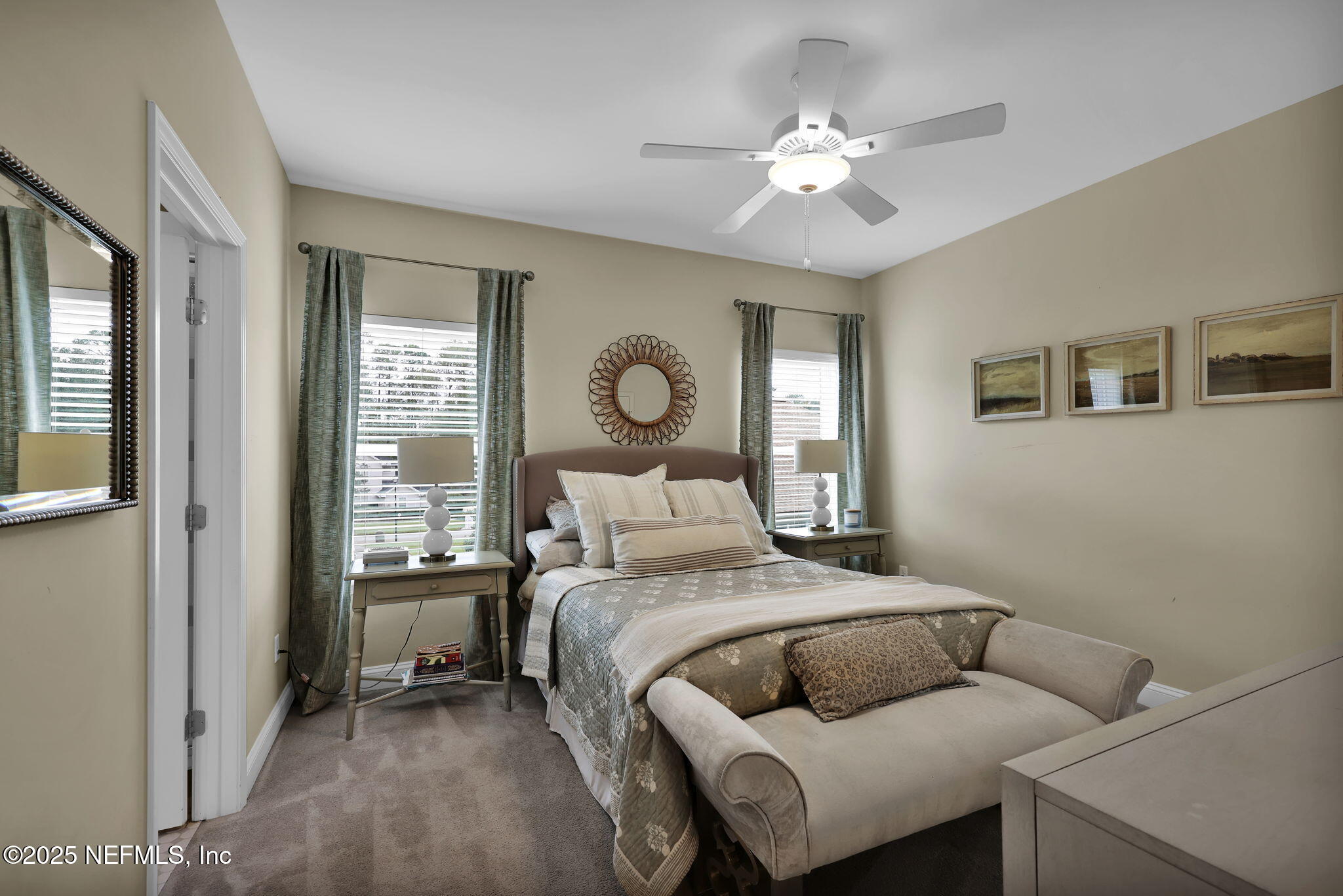 2624 Wrightson Drive Jacksonville, FL 32223 - Photo 49 of 52 a bed room with a bed and a chandelier