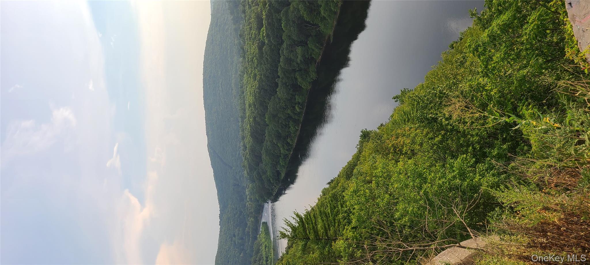 40 Beaver Brook Road Yulan, NY 12792 - Photo 21 of 25 a view of a lake from a yard