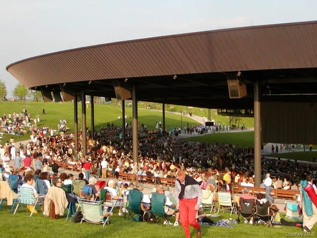 a view of a cafe with sitting area