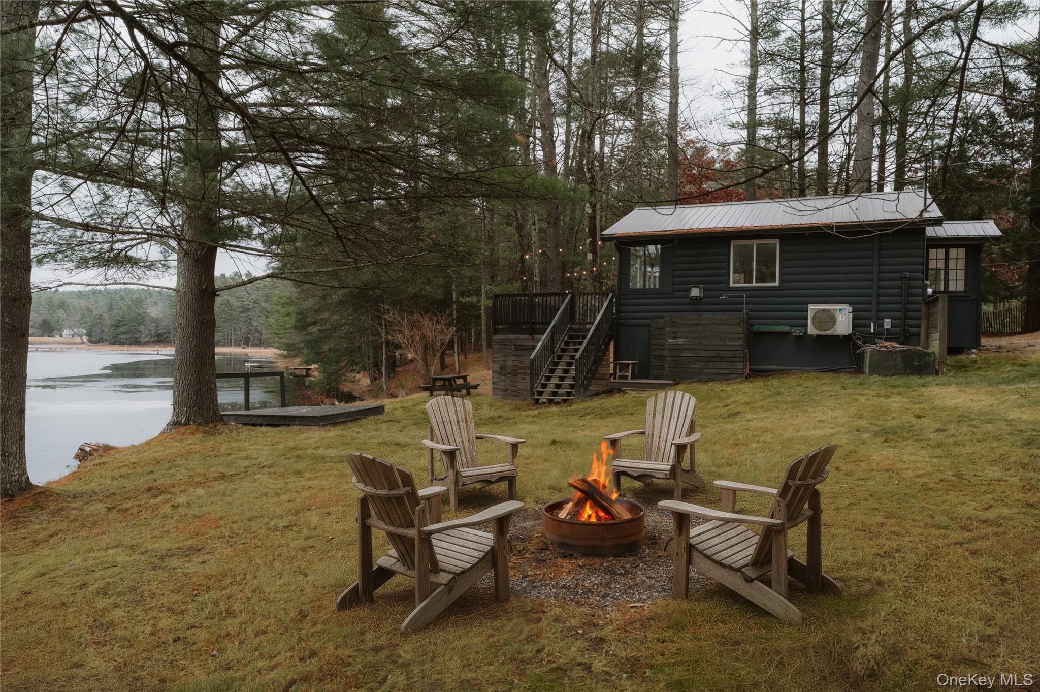 40 Beaver Brook Road Yulan, NY 12792 - Photo 6 of 25 a view of a house with backyard porch and sitting area