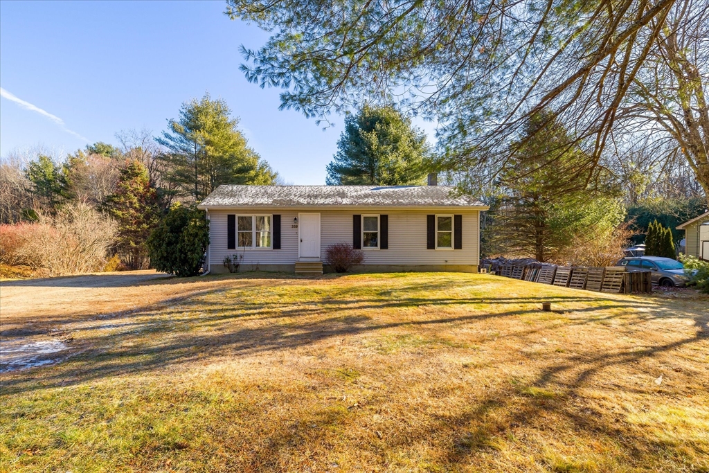 359 Bemis Road Warren, MA 01585 - Photo 1 of 27 a view of a house with a swimming pool