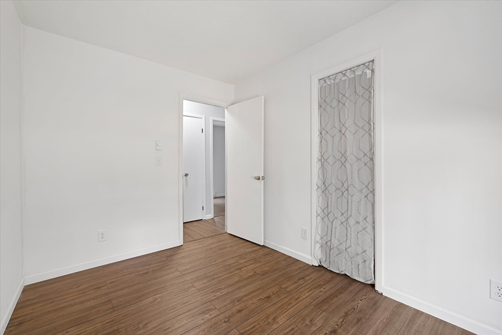 359 Bemis Road Warren, MA 01585 - Photo 18 of 27 a view of a room with wooden floor