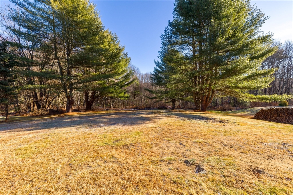 359 Bemis Road Warren, MA 01585 - Photo 4 of 27 a view of empty space with swimming pool