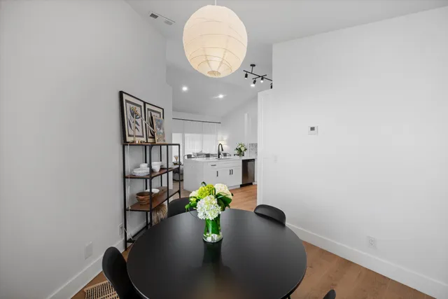 a view of a flower pot and a chair in a room