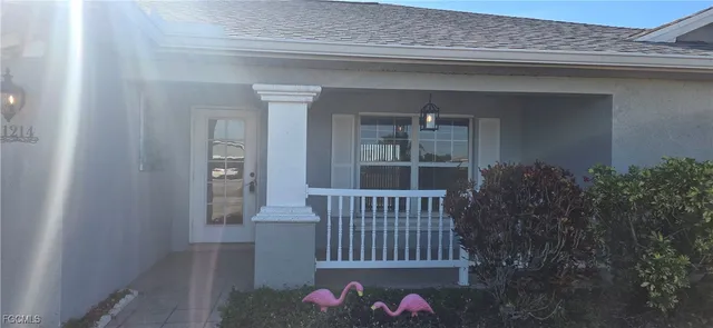 a view of a porch with a bench