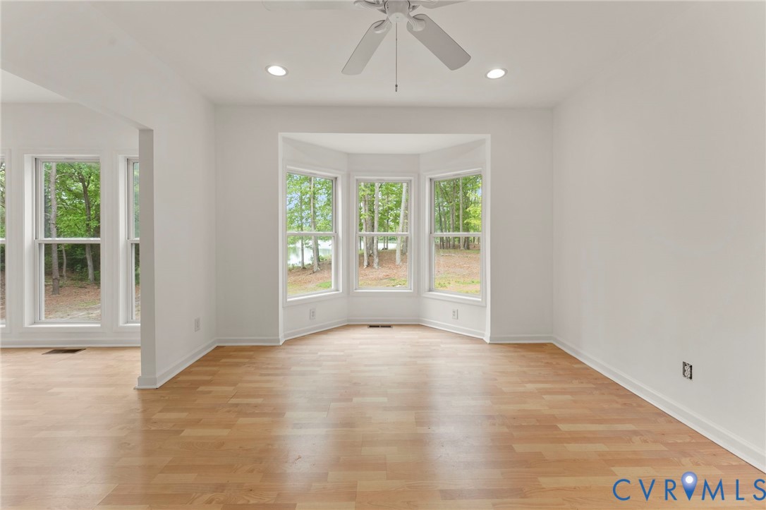 625 Whispering Pines Road Lancaster, VA 22503 - Photo 15 of 71 a view of an empty room with a window
