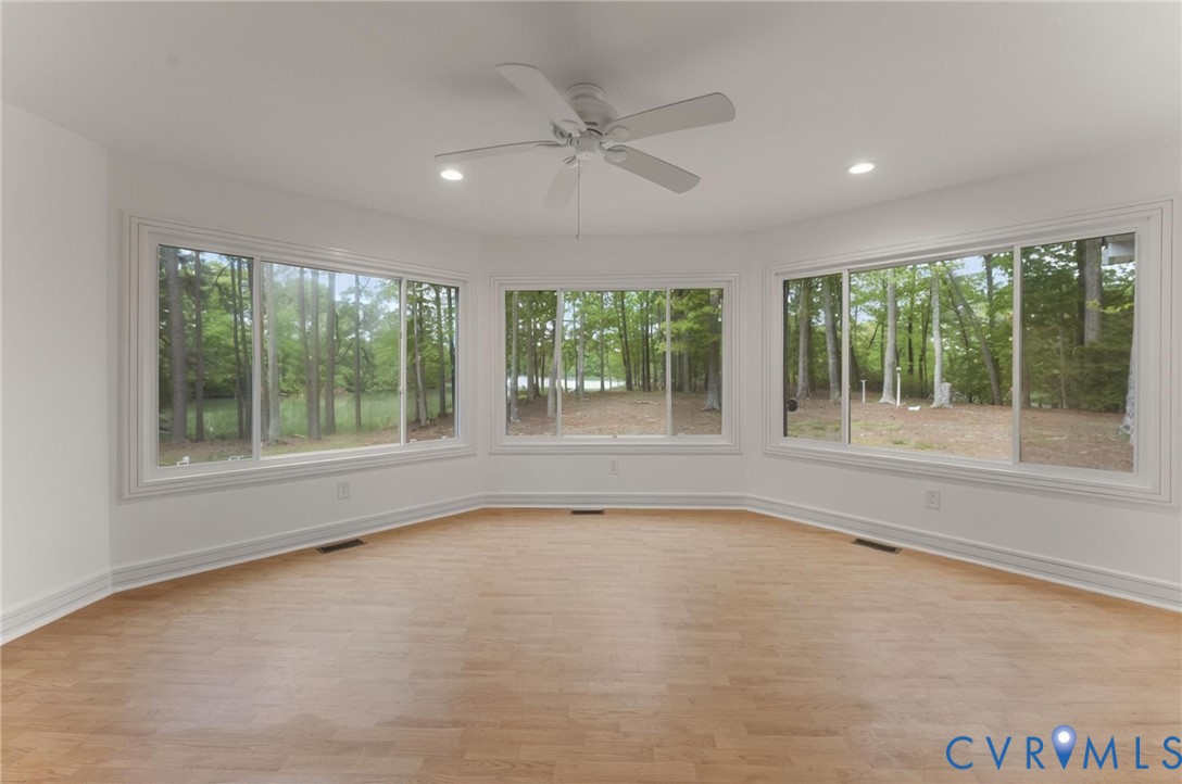 625 Whispering Pines Road Lancaster, VA 22503 - Photo 25 of 71 a view of an empty room with a window