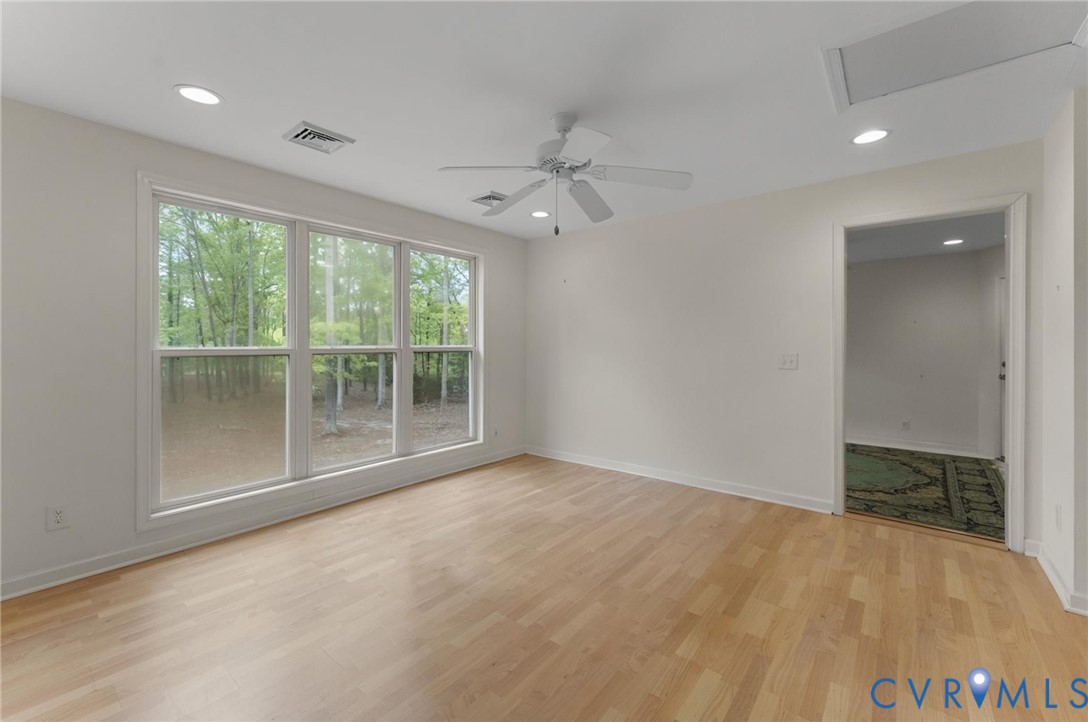 625 Whispering Pines Road Lancaster, VA 22503 - Photo 43 of 71 a view of an empty room with a window