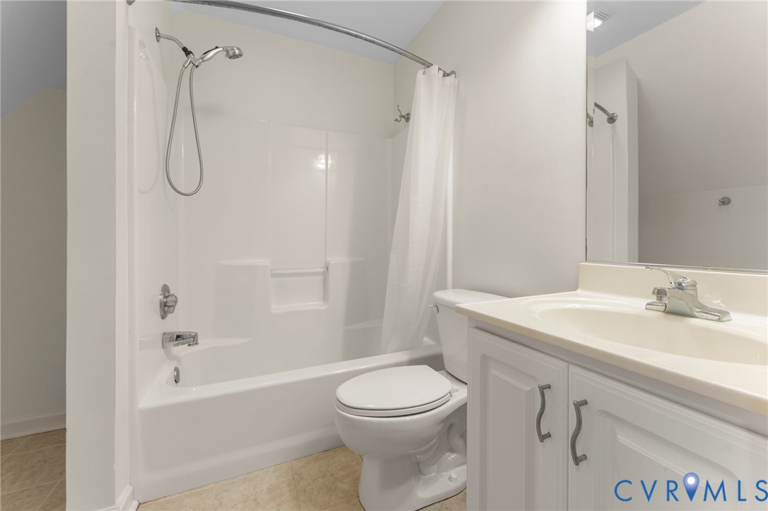 625 Whispering Pines Road Lancaster, VA 22503 - Photo 46 of 71 a bathroom with a granite countertop sink toilet and shower