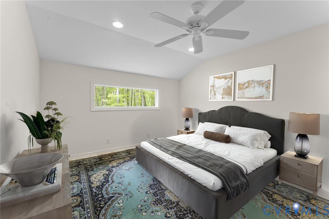 625 Whispering Pines Road Lancaster, VA 22503 - Photo 47 of 71 a bedroom with a large bed and a window
