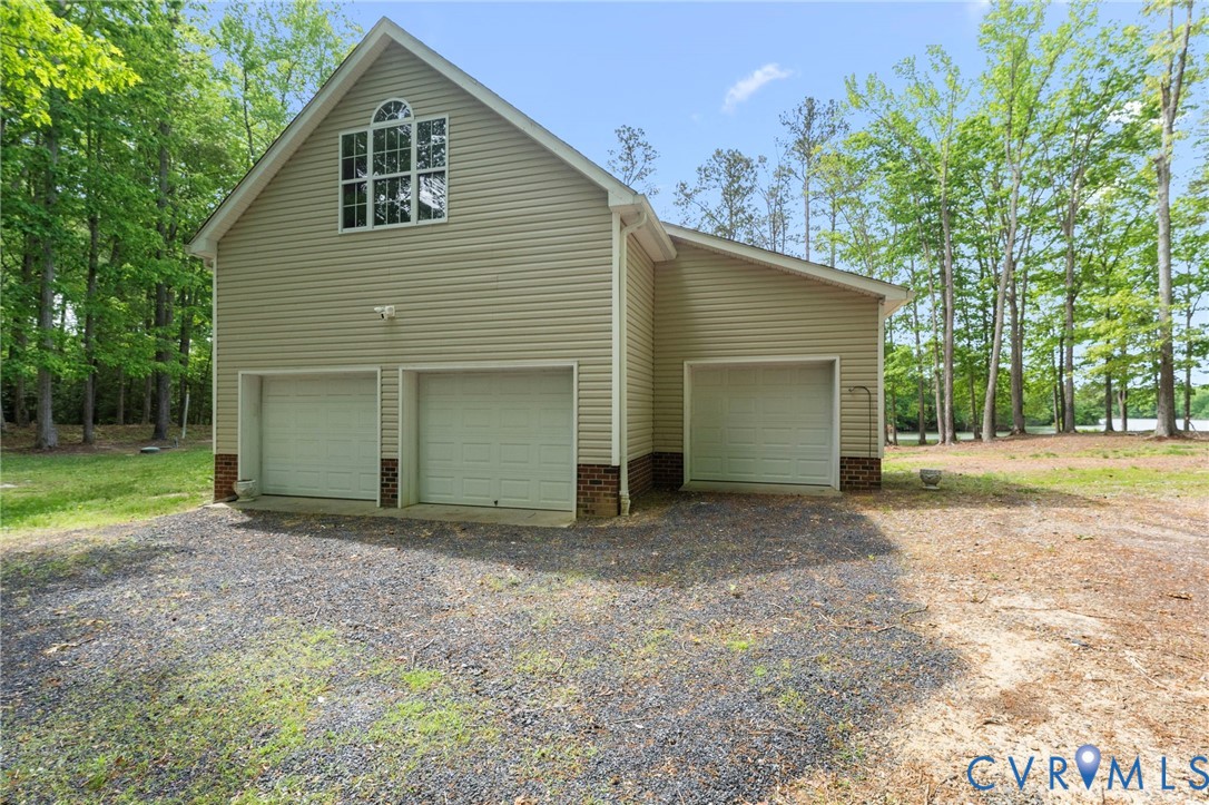 625 Whispering Pines Road Lancaster, VA 22503 - Photo 57 of 71 a view of backyard of house with green space