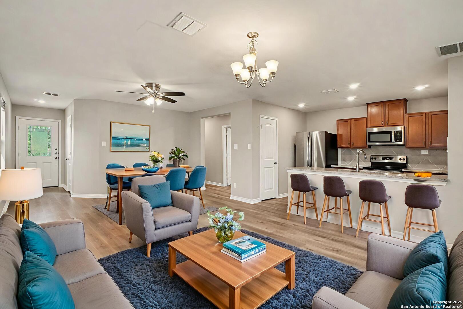 6508 Buffalo Ranch San Antonio, TX 78244 - Photo 9 of 31 a living room with furniture kitchen view and a table