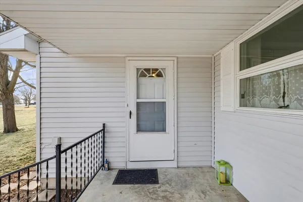 a view of a door and chair