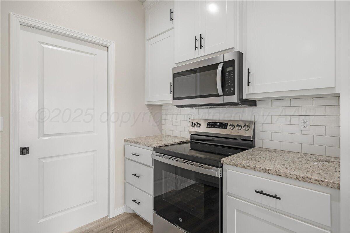 4404 Beacon Road Amarillo, TX 79118 - Photo 8 of 20 09-Kitchen 3