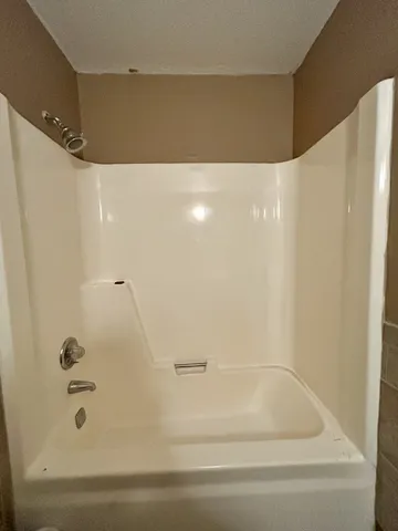 a bathroom with a bathtub