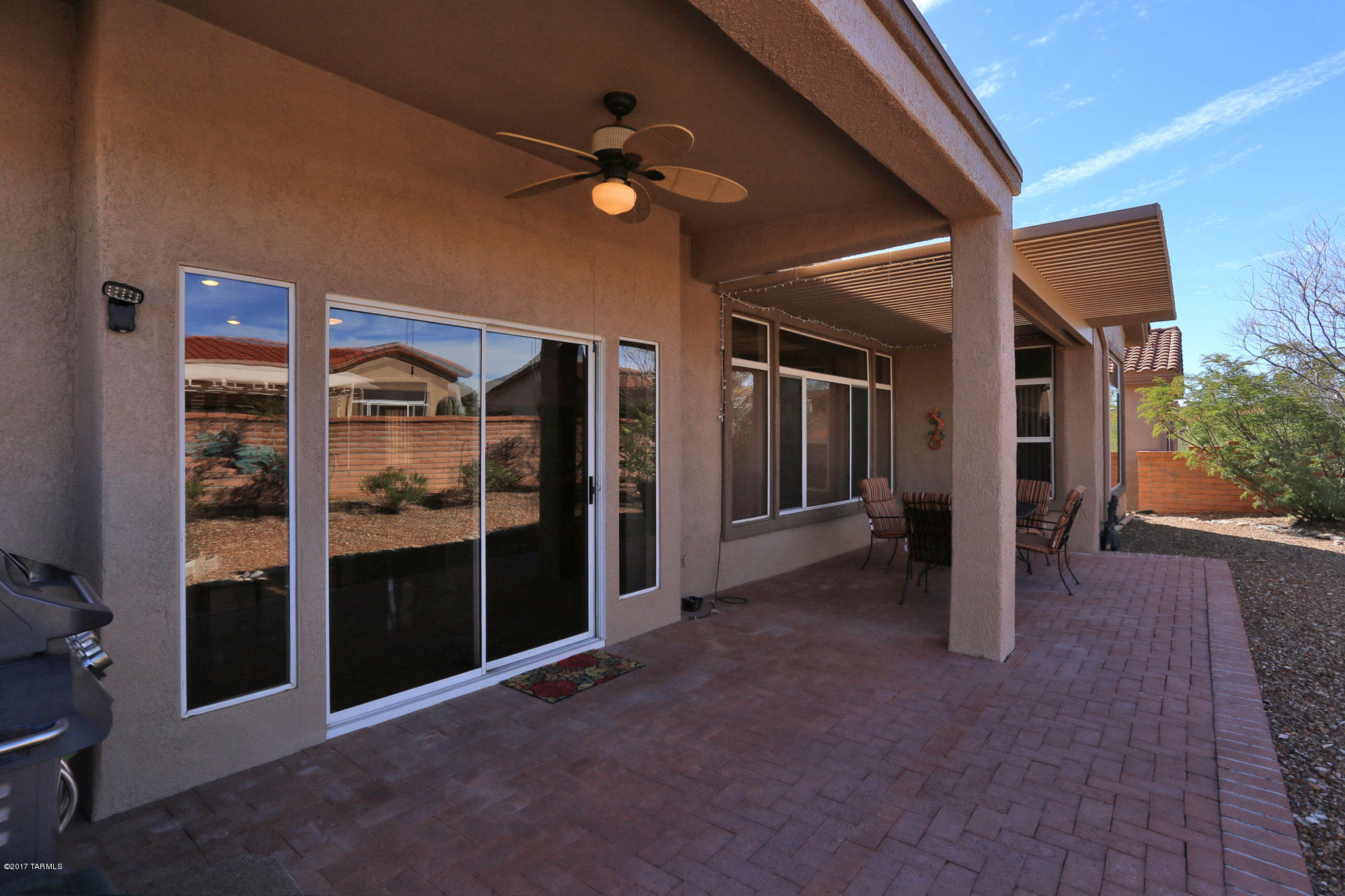 1065 East Royal Oak Road Oro Valley, AZ 85755 - Photo 17 of 19 a view of a hallway with wooden shelves