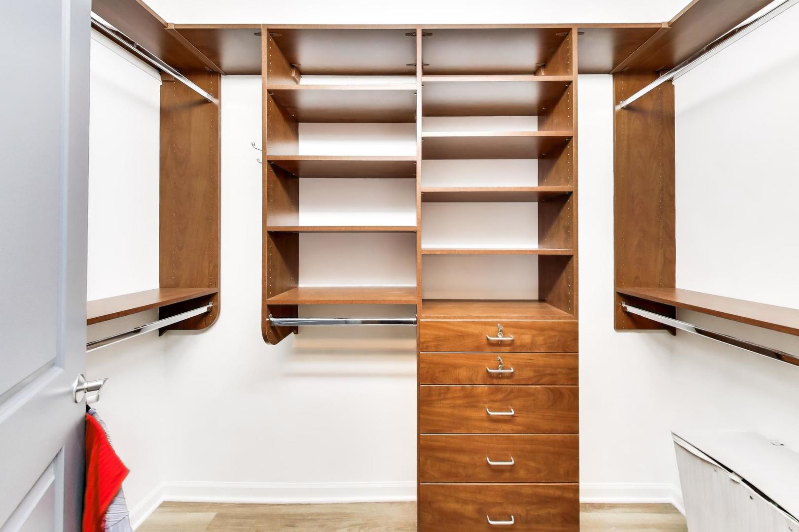 1199 East Port Clinton Road, Unit 311 Vernon Hills, IL 60061 - Photo 13 of 23 a view of walk in closet with empty racks