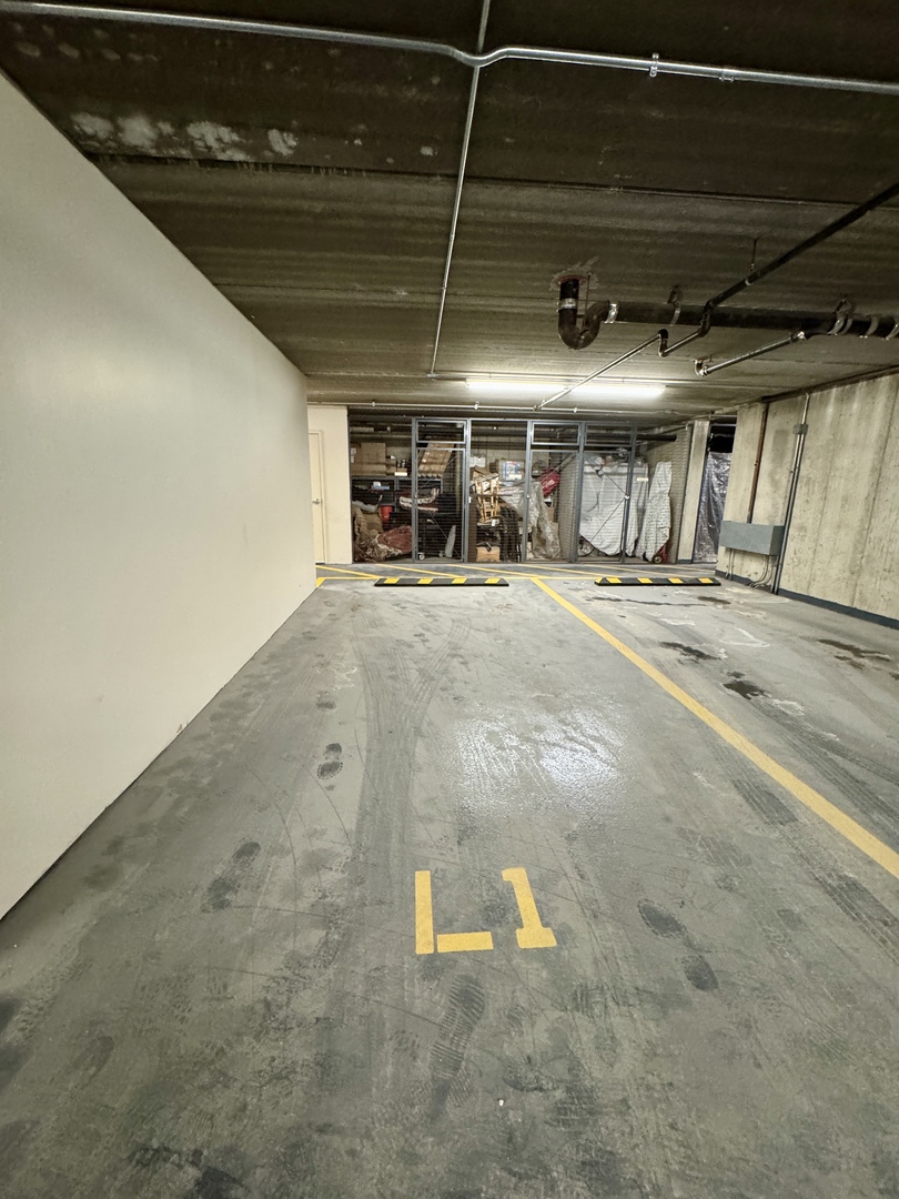 1199 East Port Clinton Road, Unit 311 Vernon Hills, IL 60061 - Photo 21 of 23 a view of a garage