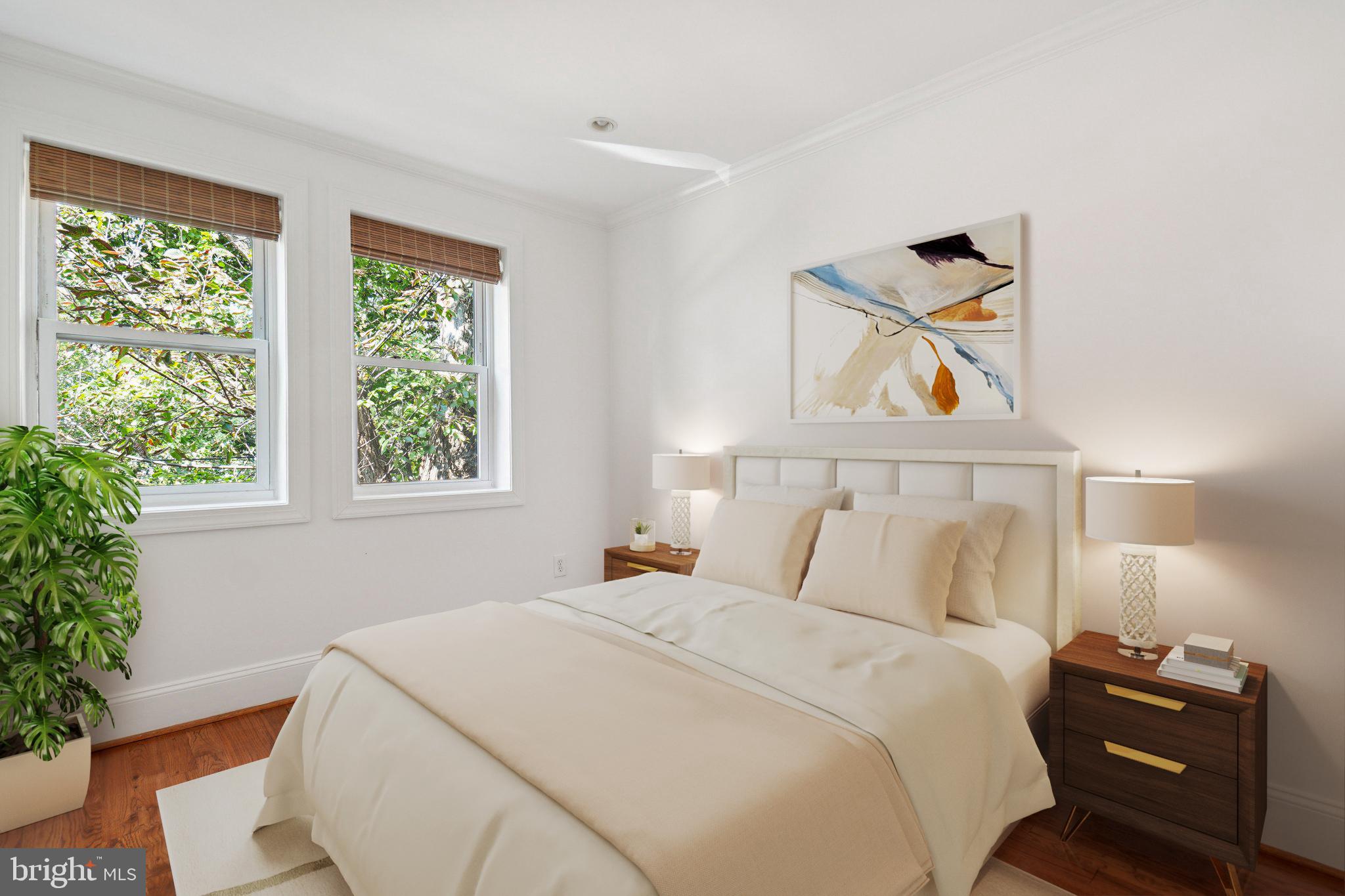 624 19th Street Northeast Washington, DC 20002 - Photo 20 of 29 a bedroom with a bed and a window