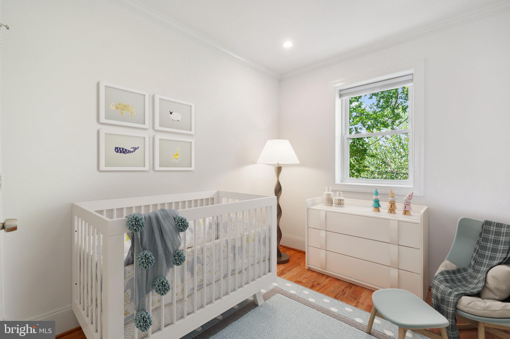 624 19th Street Northeast Washington, DC 20002 - Photo 22 of 29 a bedroom with a bed and a window