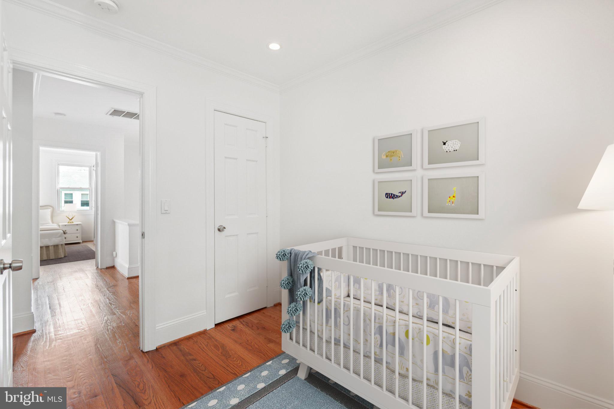 624 19th Street Northeast Washington, DC 20002 - Photo 23 of 29 a view of a bedroom with wooden floor & windows