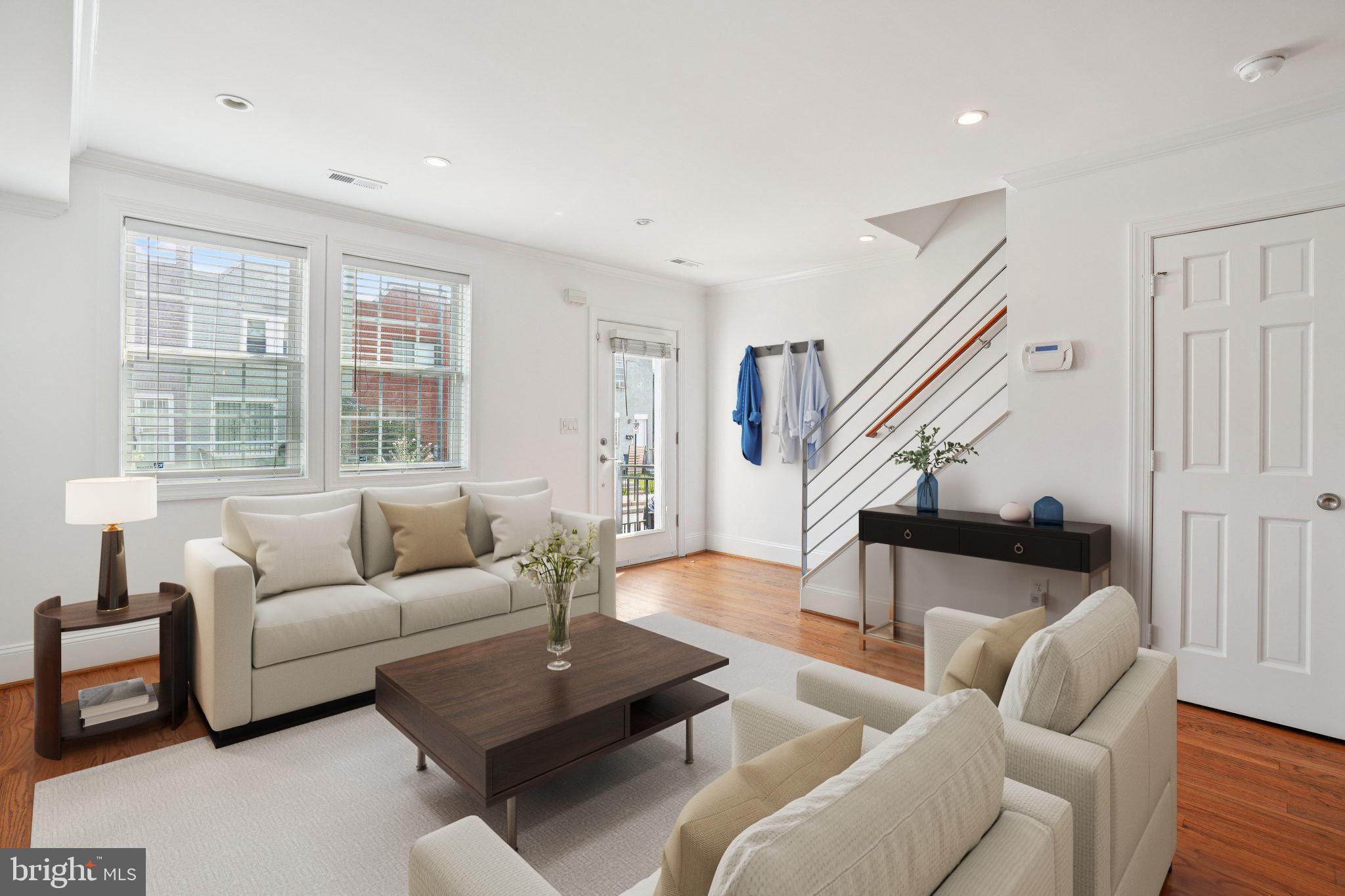 624 19th Street Northeast Washington, DC 20002 - Photo 5 of 29 a living room with furniture and a large window