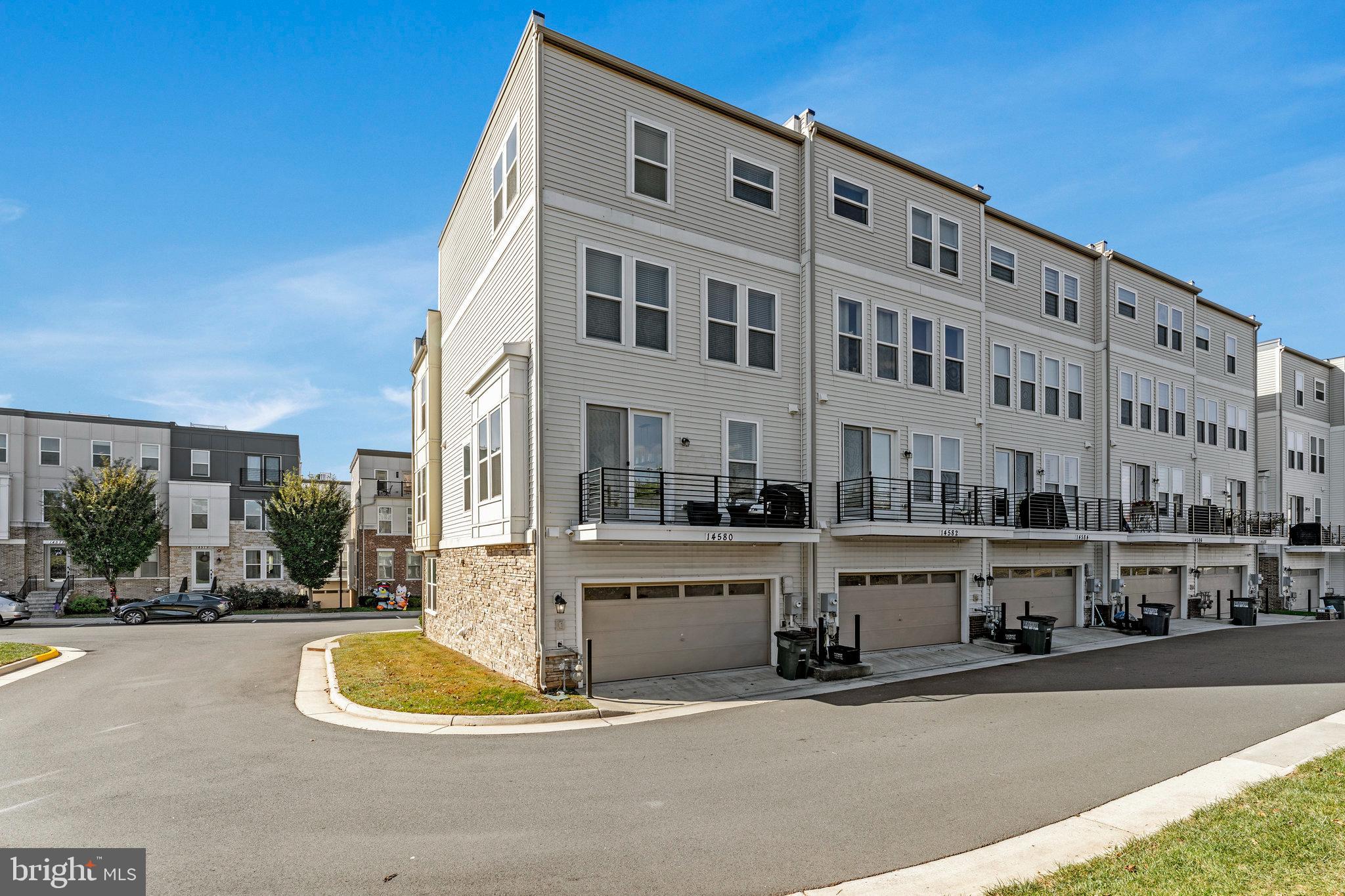 14580 Lakestone Drive Chantilly, VA 20151 - Photo 19 of 21 a view of building with cars parked