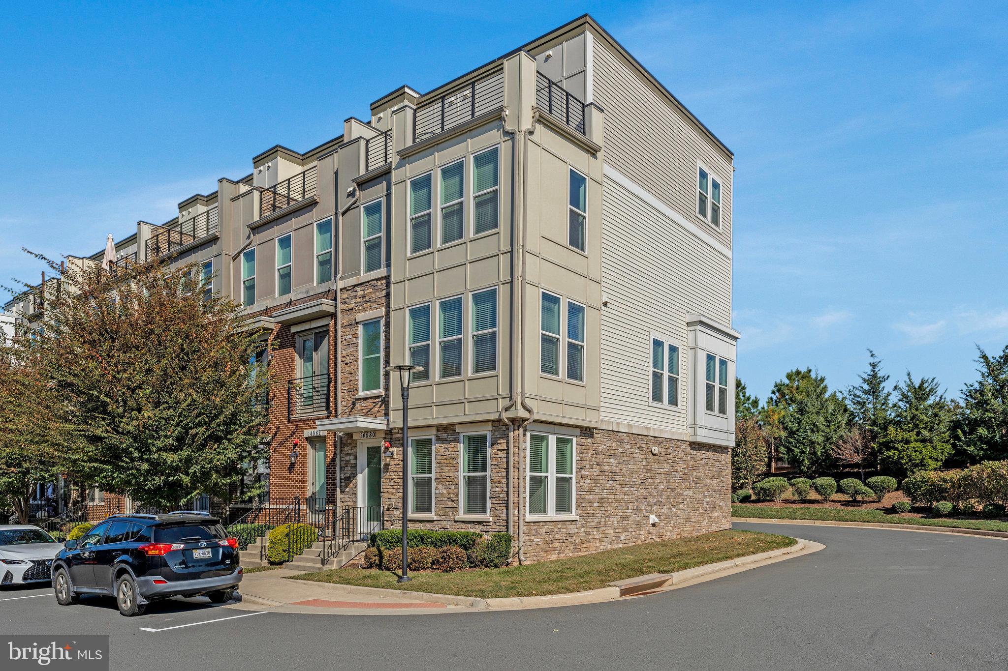 14580 Lakestone Drive Chantilly, VA 20151 - Photo 6 of 21 a view of a car parked in front of a building