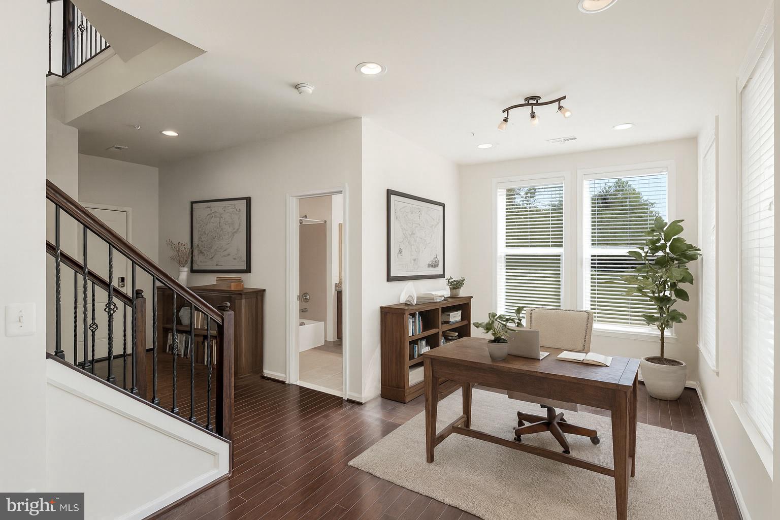 14580 Lakestone Drive Chantilly, VA 20151 - Photo 8 of 21 a view of a livingroom with furniture window and wooden floor